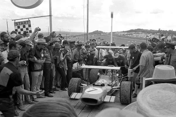Formula One World Championship: A victorious Jackie Stewart returns to the pits in his Matra MS10