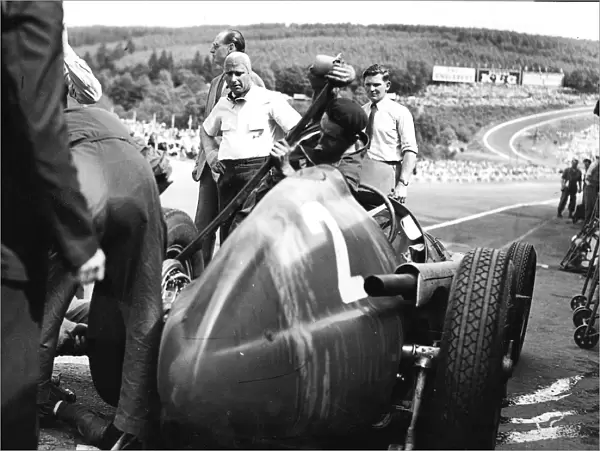 1951 Belgian Grand Prix: Juan Manuel Fangio in the pits