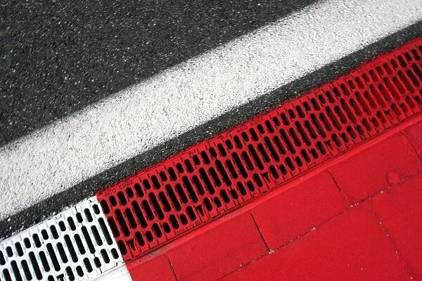 Formula One World Championship: Turn ten drain covers which came loose during the race causing the retirement of Juan Pablo Montoya McLaren