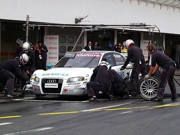 DTM. Tom Kristensen (DEN) Audi Sport Team Abt Siemens Audi A4 06, makes a pit stop.
