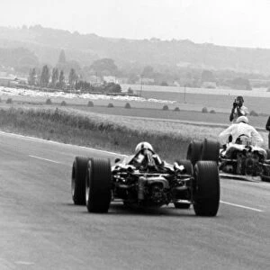 1966 French Grand Prix: Jack Brabham, Brabham BT19-Repco, 1st position, takes the lead, action