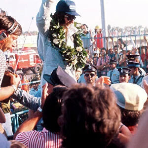 1973 Argentinian Grand Prix. Buenos Aires, Argentina. 26-28 January 1973. Emerson Fittipaldi (Lotus Ford) 1st position on the podium. Ref-73 ARG 11. World Copyright - LAT Photographic