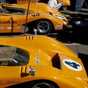 Can-Am Challenge Cup: The McLaren M8B Chevrolet machines of Bruce McLaren, Chris Amon and Denny Hulme in the paddock