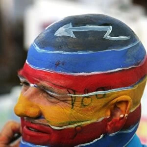 Formula One World Championship: A head is painted just like the helmet of Fernando Alonso Renault