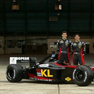 Formula One World Championship: Mark Webber, left, and team mate Alex Yoong KL Minardi Asiatech PS02 upon their arrival in Australia
