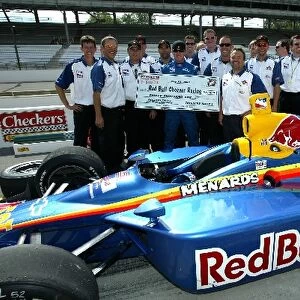 Indy Racing League: Buddy Rice and his Red Bull Cheever crew celebrate the pit stop competition victory