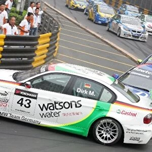 Macau WTCC: Dirk Muller BMW is pushed into a spin by Fabrizio Giovanardi JAS Motorsport