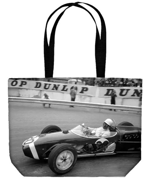 Formula One World Championship: Stirling Moss drove one of his greatest races in the under-powered Rob Walker Lotus 18 to take victory in the