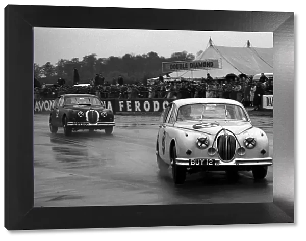 British Saloon Car Racing: Jaguar Mk2├òs race in the wet: British Saloon Car Racing, Silverstone, England, July 1962