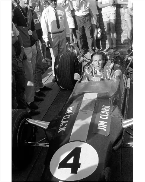 Formula One World Championship: Race winner Jim Clark Lotus 49 in Parc Ferme