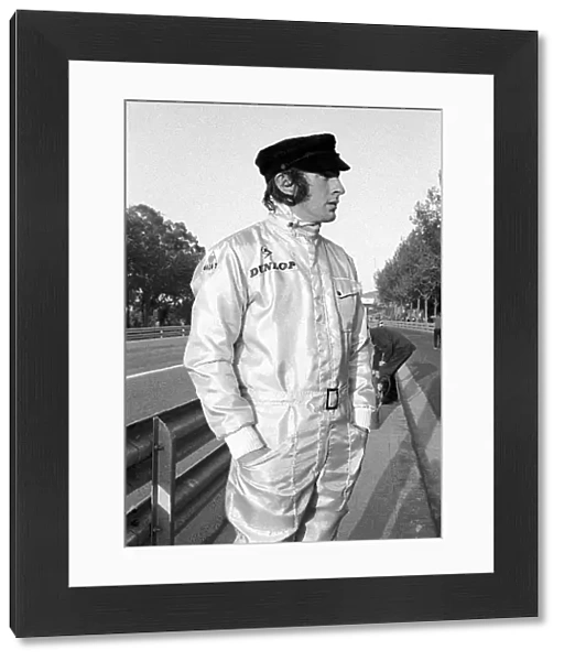 Formula One World Championship: Jackie Stewart winner in Matra MS80, shows off a natty line in head gear