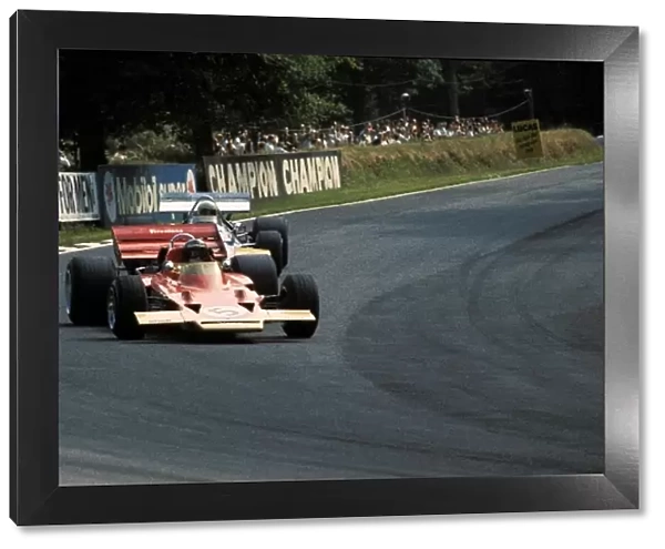 Formula One World Championship: Pole sitter Jochen Rindt Lotus 72C, who made it a hat trick of victories, leads second placed finisher Jack Brabham