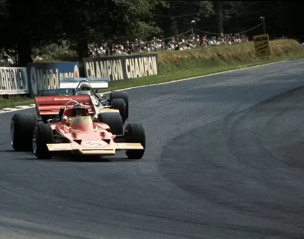 Formula One World Championship: Pole sitter Jochen Rindt Lotus 72C, who made it a hat trick of victories, leads second placed finisher Jack Brabham