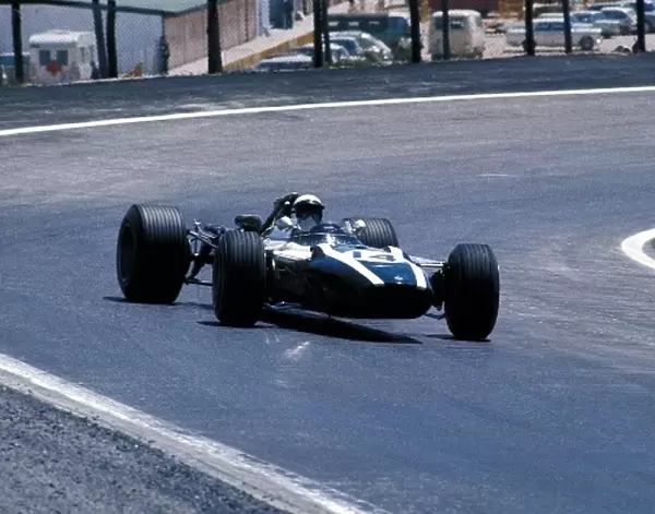 Formula One World Championship: Ludovico Scarfiotti lets the tail hang out in his Cooper BRM T86B on his way to fourth place