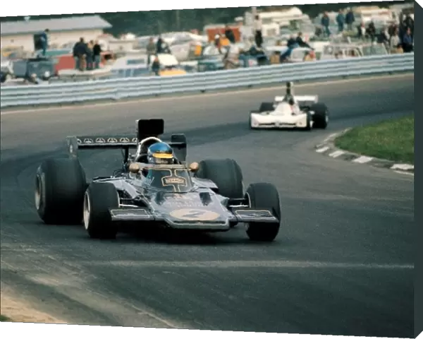 Formula One World Championship: Winner Ronnie Peterson Lotus 72E leads 2nd placed James Hunt