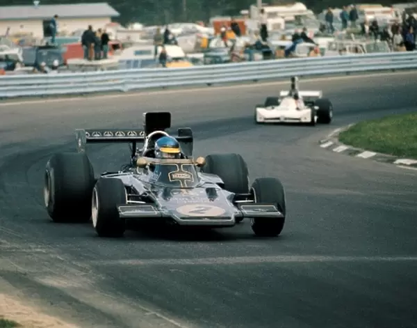 Formula One World Championship: Winner Ronnie Peterson Lotus 72E leads 2nd placed James Hunt