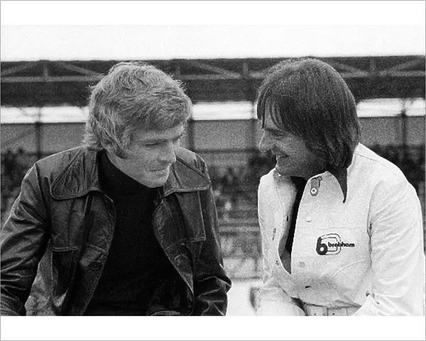 Formula One World Championship: Max Mosley March Team Principal talks with Bernie Ecclestone Brabham Team Owner