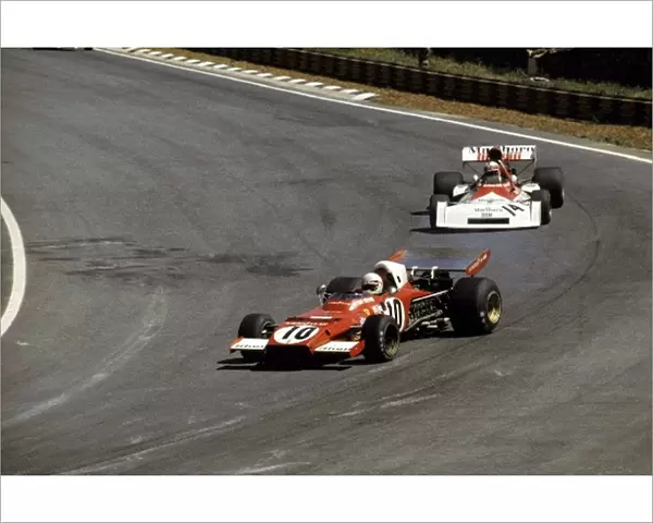 Formula One World Championship: Arturio Merzario Ferrari 312B2, who scored his first GP points with a fourth place finish, leads Clay Regazzoni