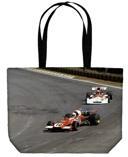 Formula One World Championship: Arturio Merzario Ferrari 312B2, who scored his first GP points with a fourth place finish, leads Clay Regazzoni