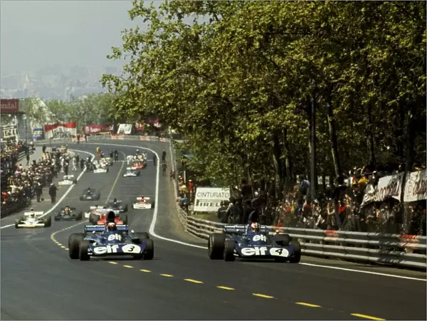 Formula One World Championship: Jackie Stewart Tyrrell 006, who retired with brake failure on lap 48, and his team mate Francois Cevert Tyrrell 006  /  2