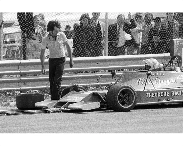 Formula One World Championship: A mechanic comes to replace the punctured front right tyre of the Ensign Theodore N174 of Vern Schuppan at the