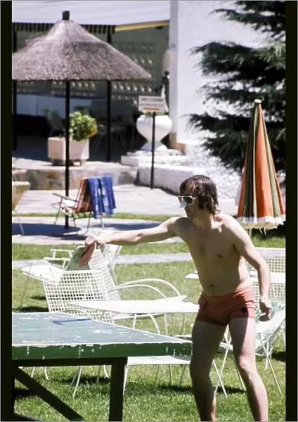 Formula One World Championship: Second placed Jackie Stewart enjoys a game of table tennis at the Kyalami Ranch Hotel