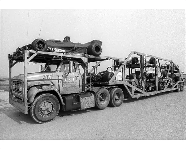 Formula One World Championship: A transporter carrying some of the competing cars to the circuit