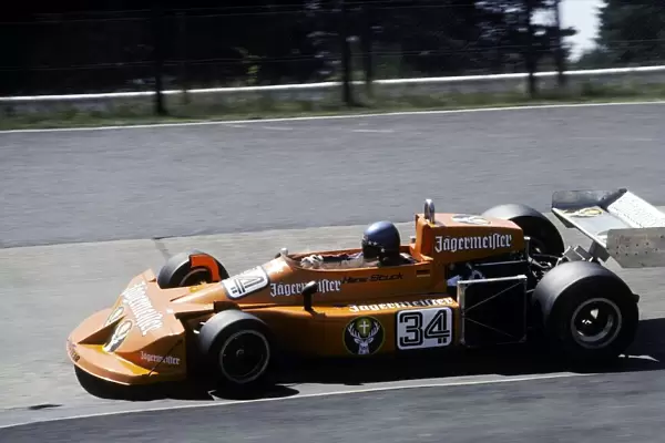 Formula One World Championship: Hans-Joachim Stuck March 761 retired on the opening lap of the race with a broken clutch