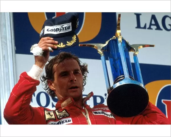 Formula One World Championship: Winner Gerhard Berger Ferrari F1  /  87 on the podium