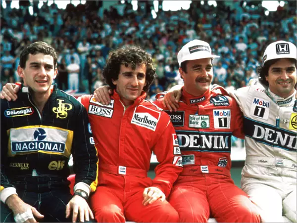 Formula One World Championship: Ayrton Senna Lotus 98T, 4th place, Alain Prost McLaren MP4  /  2C, 2nd place, Winner Nigel Mansell Williams FW11