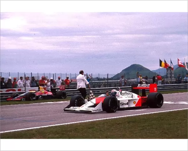 Formula One World Championship: Alain Prost McLaren MP4  /  4 Honda RA168-E takes the flag and the win
