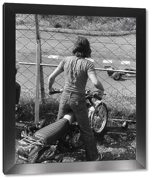 Formula One World Championship: 1976 500cc Motorcycle World Champion Barry Sheene, a close friend of James Hunt, watches the on track action