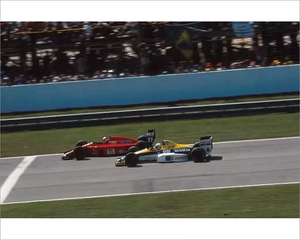 Formula One World Championship: Riccardo Patrese Williams FW12C on the inside of Winner Nigel Mansell Ferrari 640