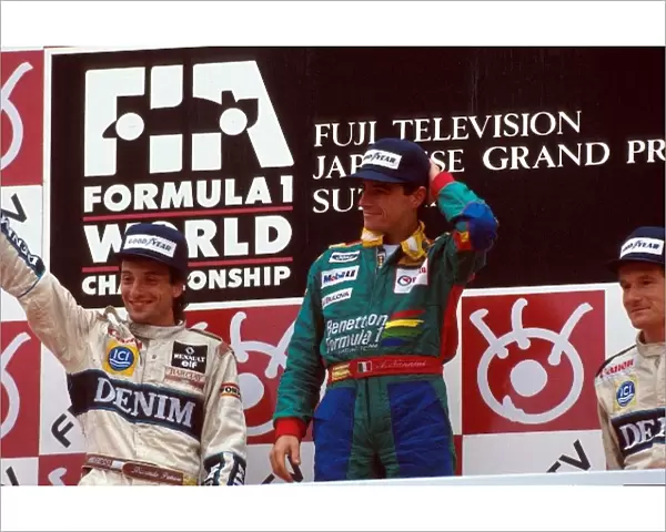 Formula One World Championship: Winner Alessandro Nannini, on the podium with 2nd place Riccardo Patrese and 3rd place Thierry Boutsen