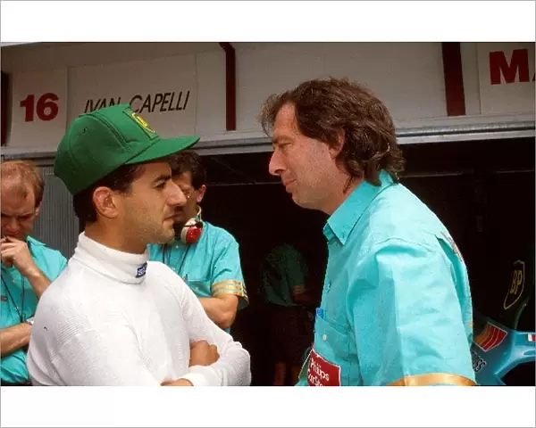 Formula One World Championship: Ivan Capelli, left, talks with Ian Phillips