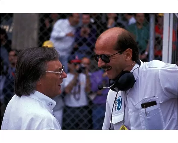 Formula One World Championship: Bernie Ecclestone F1 Supremo talks with a man