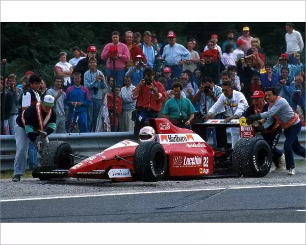 Formula One World Championship: Andrea de Cesaris and Pierluigi Martini clashed, stopping the race