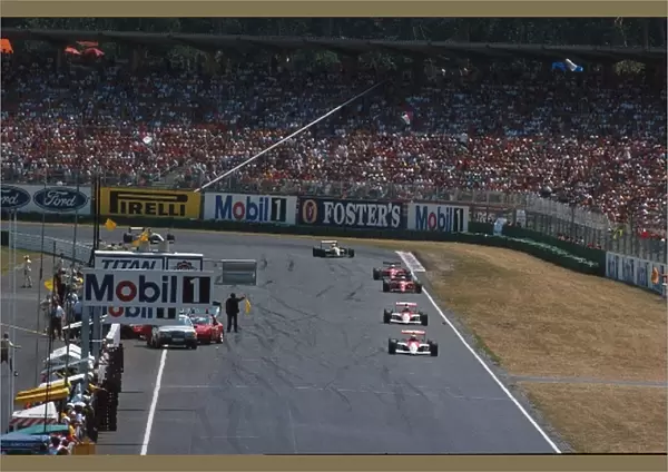 Formula One World Championship: The McLarens of Ayrton Senna and Gerhard Berger pass the accident of Emanuelle Pirros Dallara