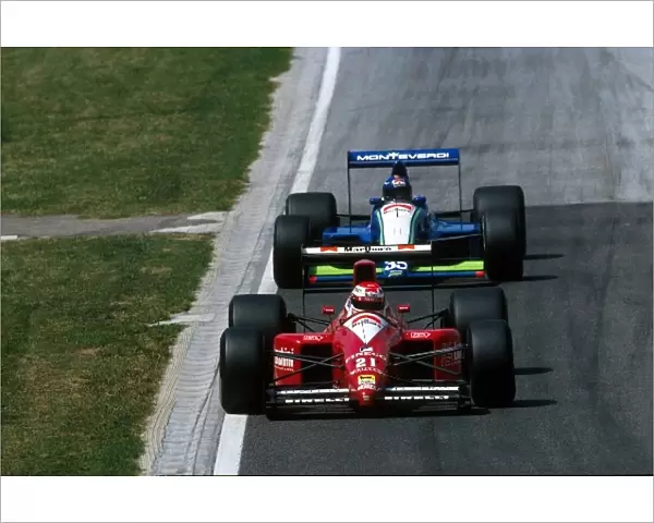 Formula One World Championship: Emanuele Pirro Dallara Cosworth 190 leads Gregor Foitek Onyx Cosworth ORE-2