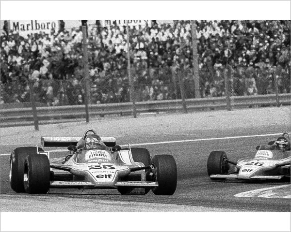 Formula One World Championship: Race winner Patrick Depailler Ligier JS11 leads his team mate Jacques Laffite Ligier JS11, who retired from the