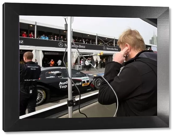 DTM. Ex-Formula 1 driver Mika Hakkinen (FIN) watches the action.