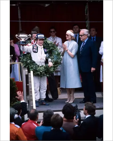 Formula One World Championship: First time race winner Patrick Depailler Tyrrell accepts his trophy from HSH Princess Grace of Monaco and HSH