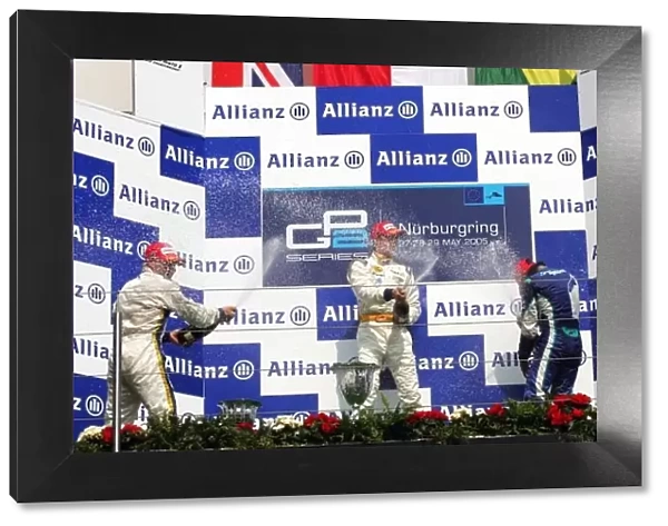 GP2. The podium (L to R): Adam Carroll (GBR) Supernova, second; Adam Carroll 