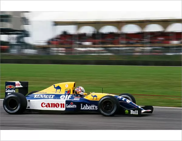 Formula One World Championship: Race winner Nigel Mansell Williams Renault FW14B