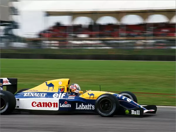 Formula One World Championship: Race winner Nigel Mansell Williams Renault FW14B