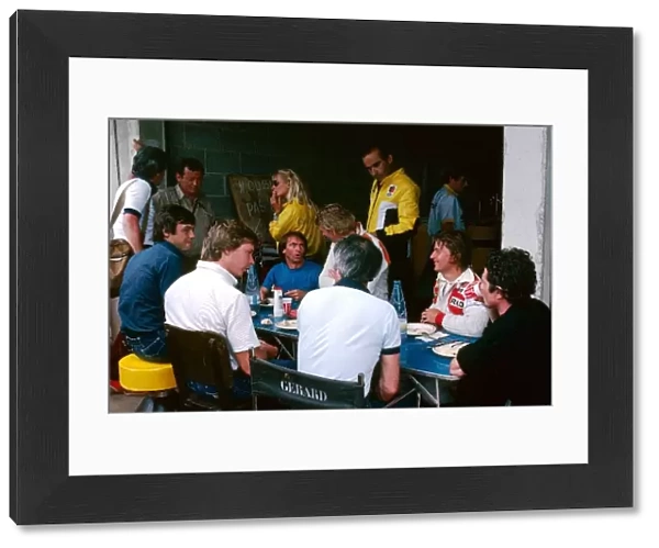 Formula One World Championship: The French drivers enjoy lunch together: Patrick Tambay McLaren; Didier Pironi Tyrrell; Jacques Laffite Ligier