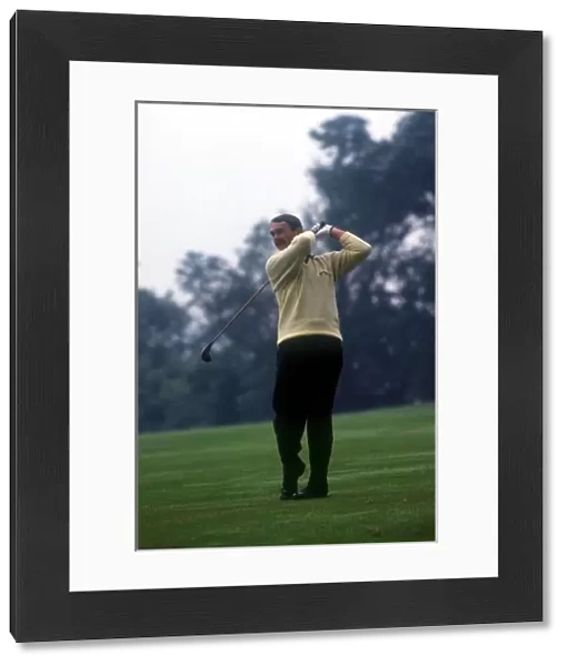 Formula One World Championship: Nigel Mansell plays golf at the Buckingham Golf Club prior to the British Grand Prix