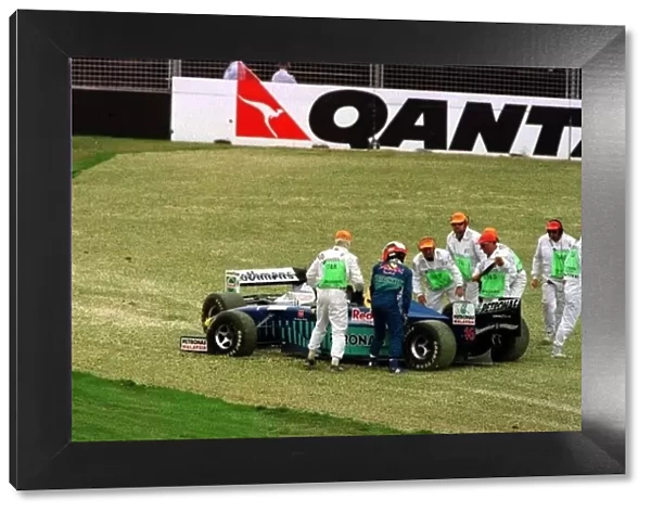 1997 AUSTRALIAN GP. Johnny Herbert and Jacques Villeneuve are both taken off at