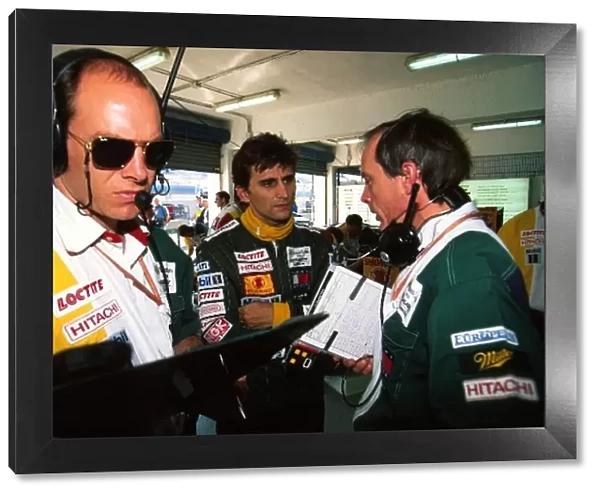 Formula One World Championship: Jock Clear Lotus Race Engineer with Alessandro Zanardi Lotus 109 and another engineer