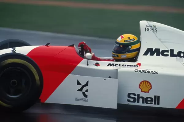 Formula One World Championship: Ayrton Senna McLaren MP4  /  8 took a dominant victory in the wet conditions